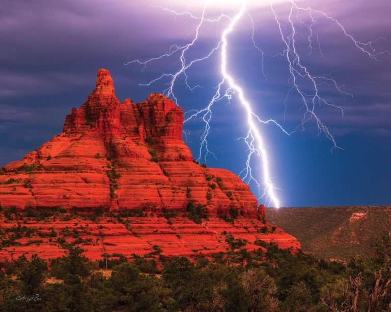 Lightning strike over the red rocks during a Sedona monsoon storm