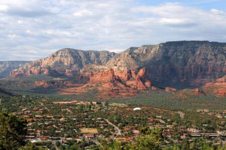 Panoramic view of Sedona town with red sandstone rocks in the distance
