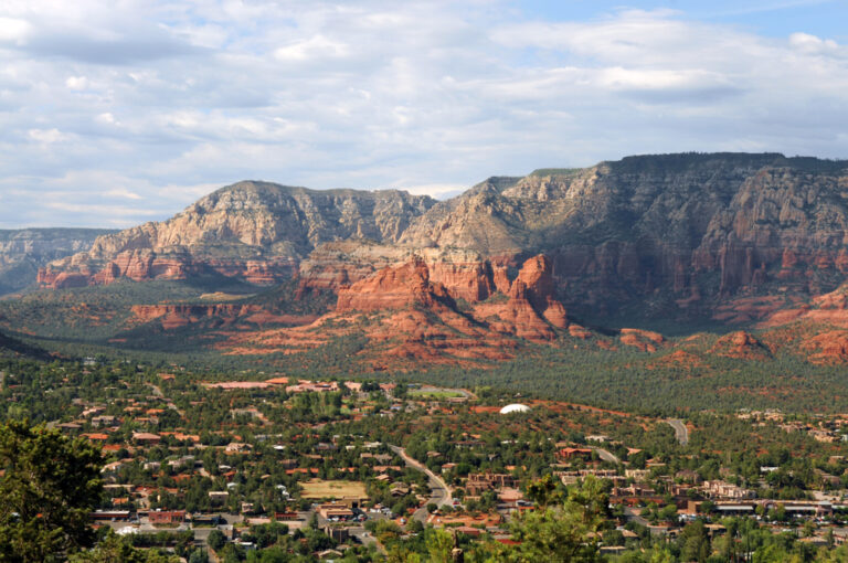 Panoramic view of Sedona town with red sandstone rocks in the distance