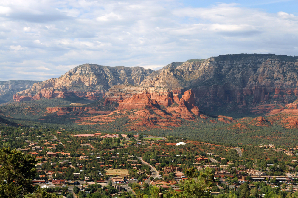 4 Incredible Things to Do in Sedona Besides Hiking Panoramic view of Sedona town with red sandstone rocks in the distance